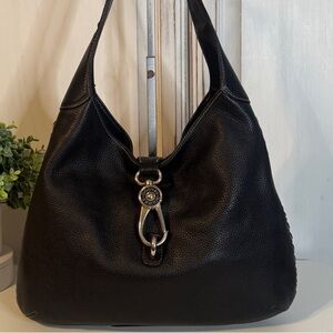 Dooney & Bourke black pebble grain leather logo lock hobo bag.